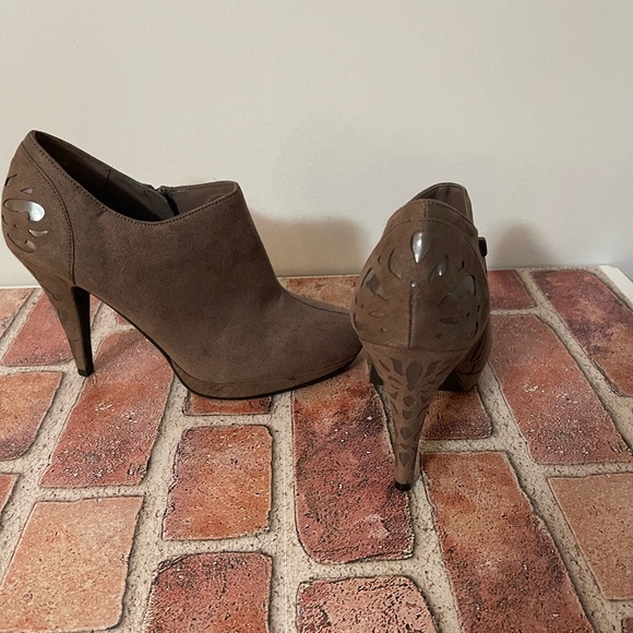 Ankle Boots Size 7 with 4" platform heels and design cutouts on heels. - Picture 3 of 5